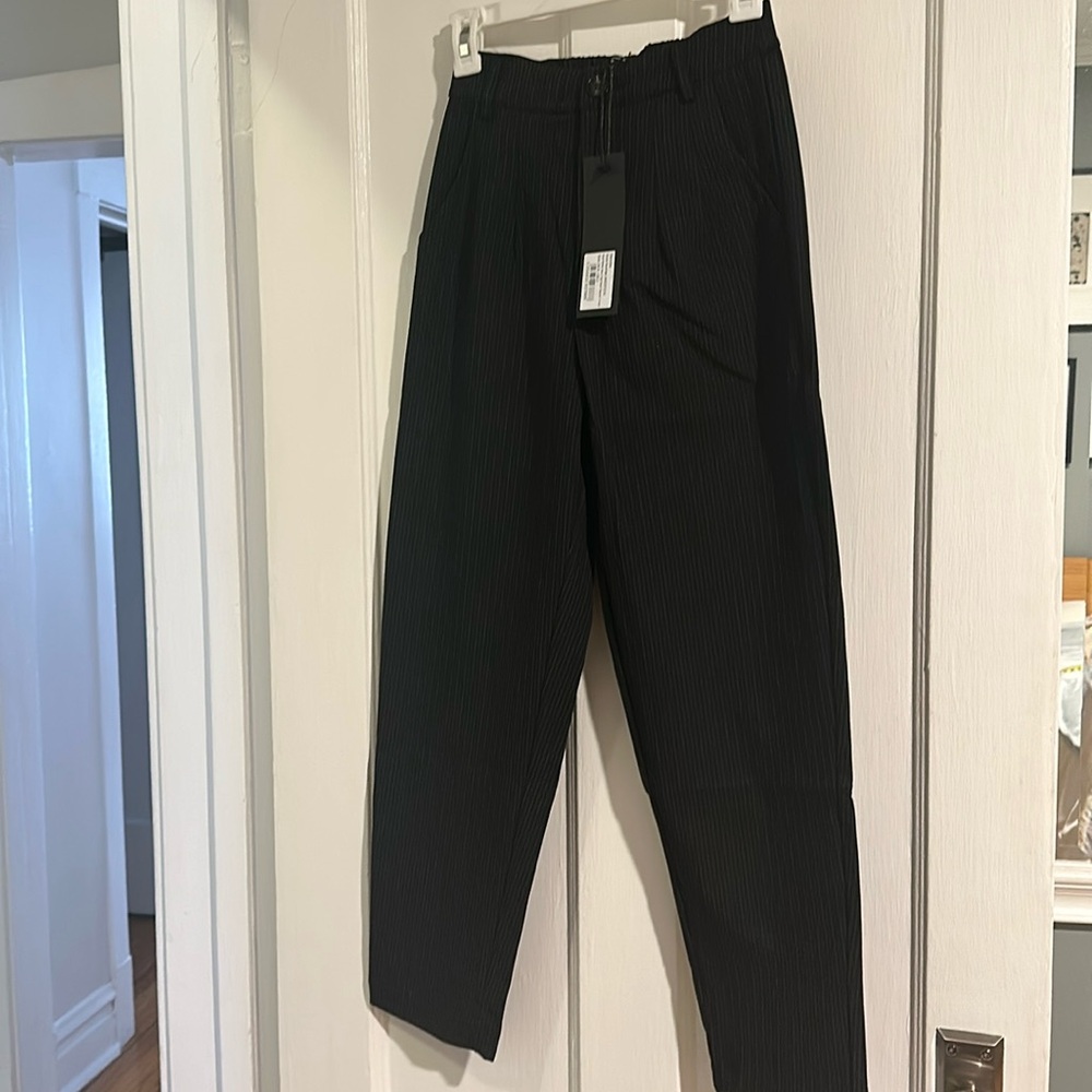 Disturbia. Pin strip new trouser.
